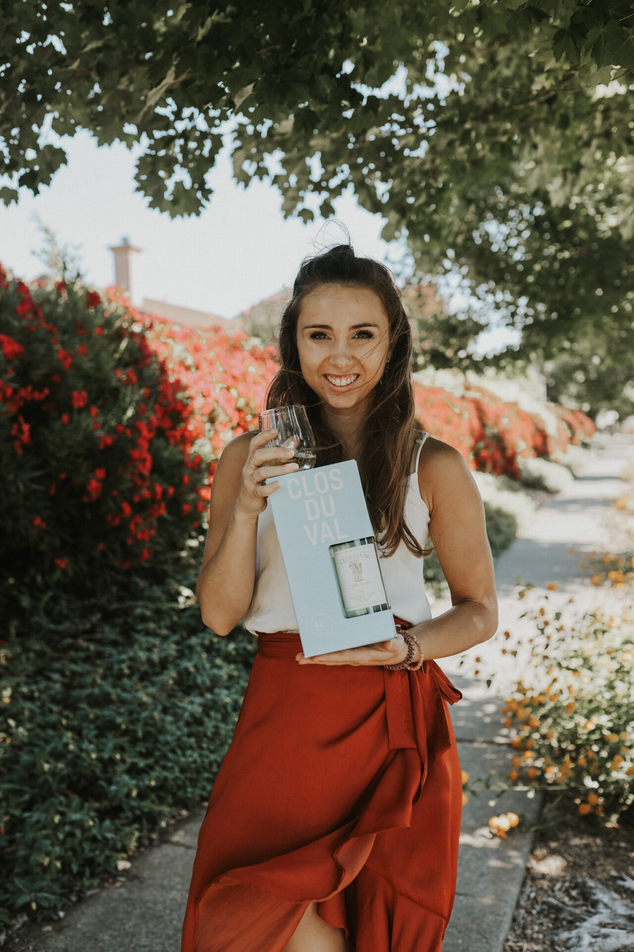 Paige holding Clos du Val Chardonnay