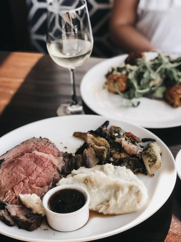 a steak dinner being served at Kincaid's Burlingame