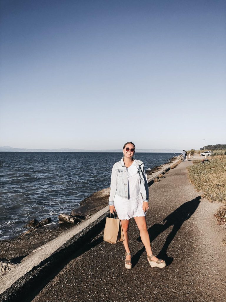 a girl on the coast at Kincaid's Burlingame