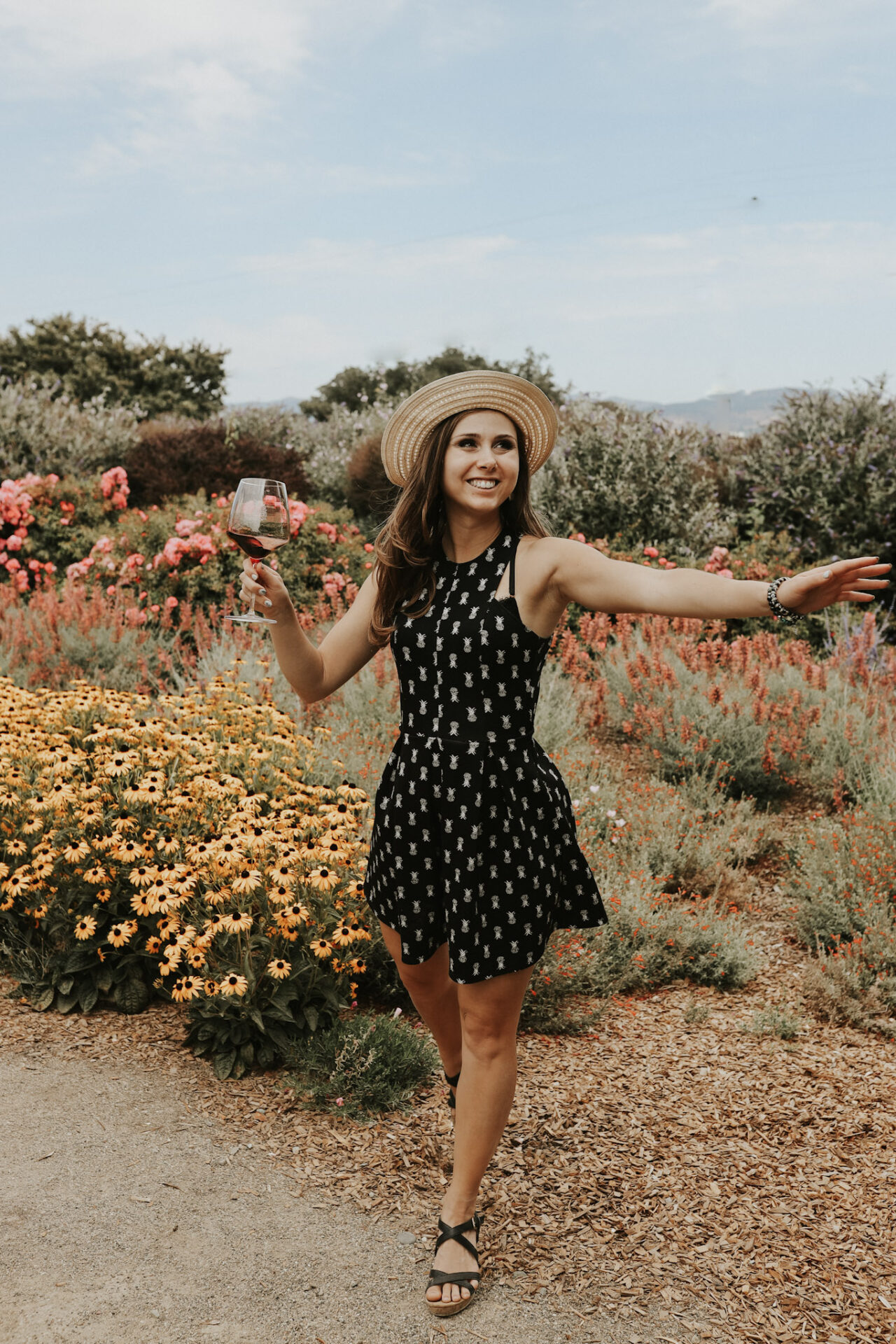 Paige drinking wine for summer drinking captions for instagram