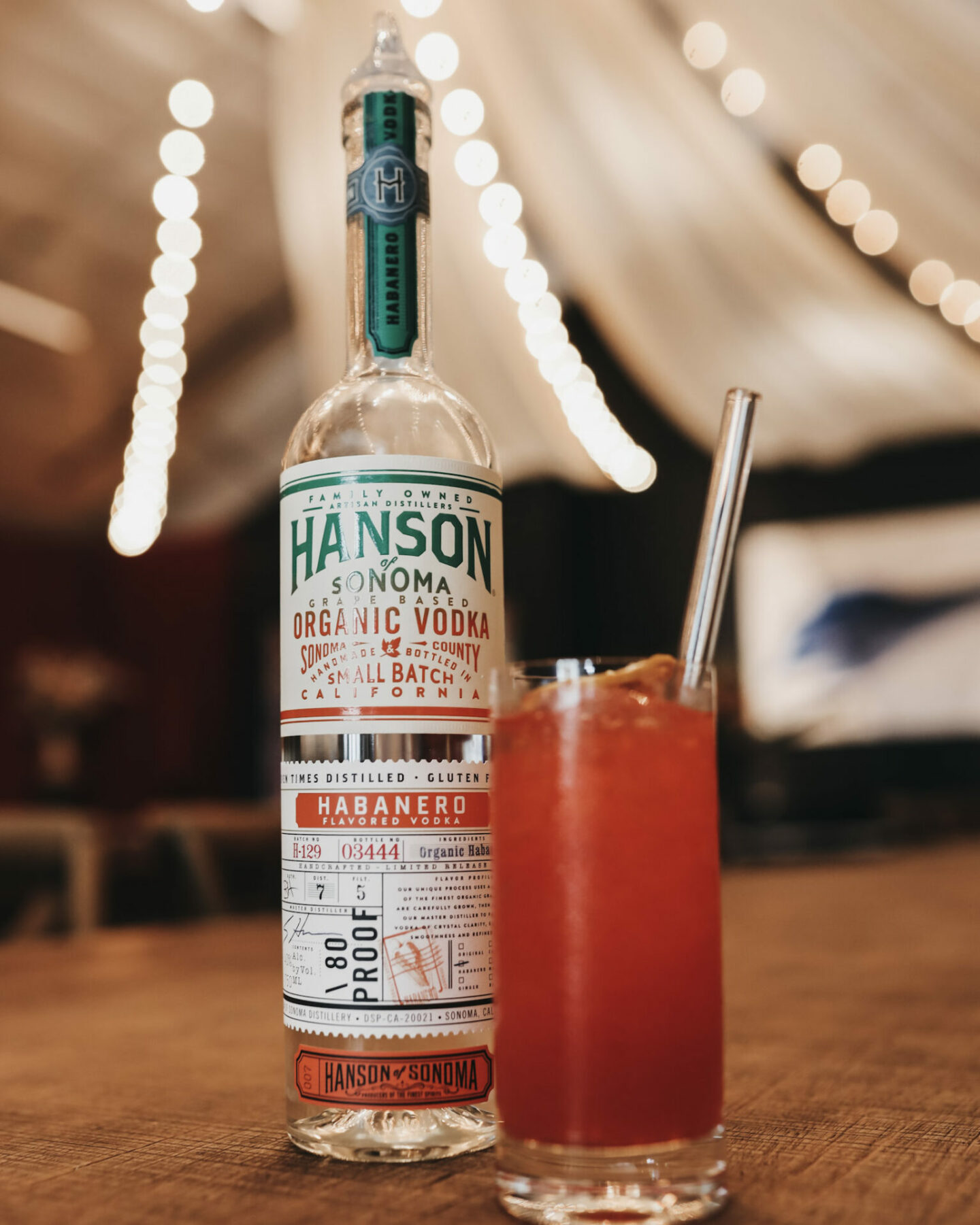 Bottle of Hanson Sonoma Vodka with mixed drink