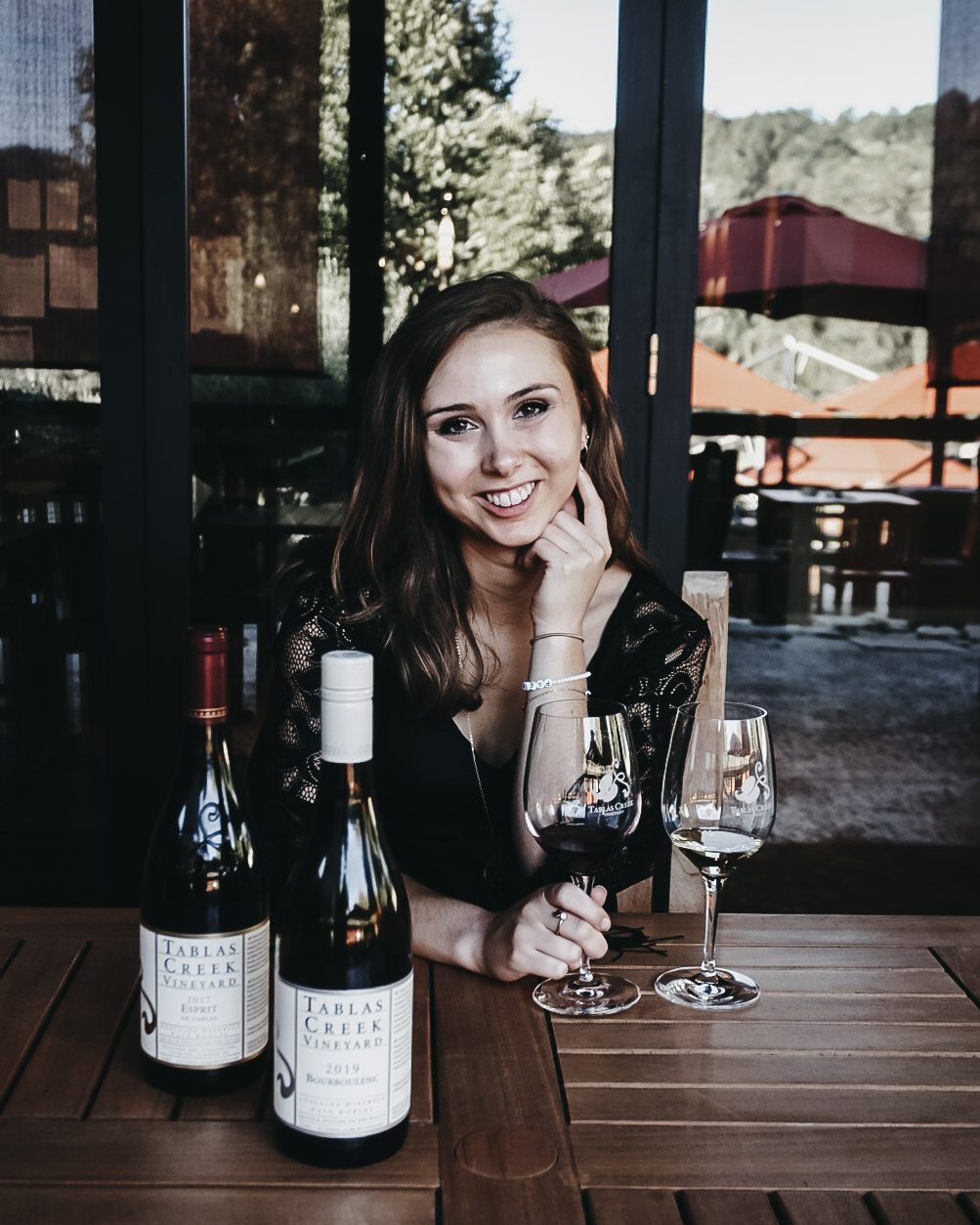 a girl sipping wine at Tablas Creek winery