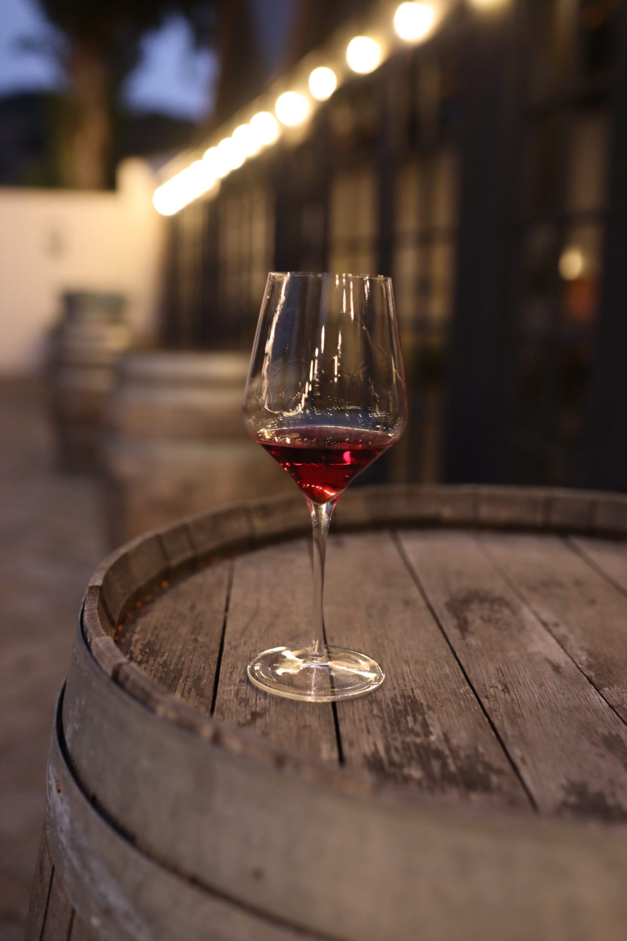 Wine glass on a table at Folktale Winery