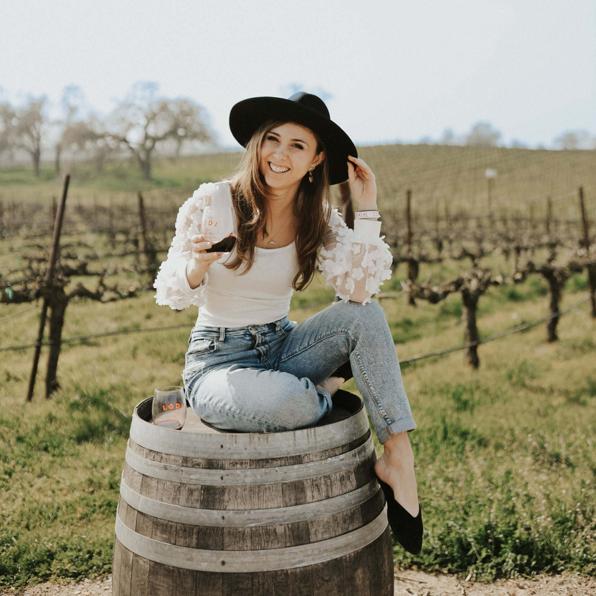 a woman at one of many Oakville Wineries