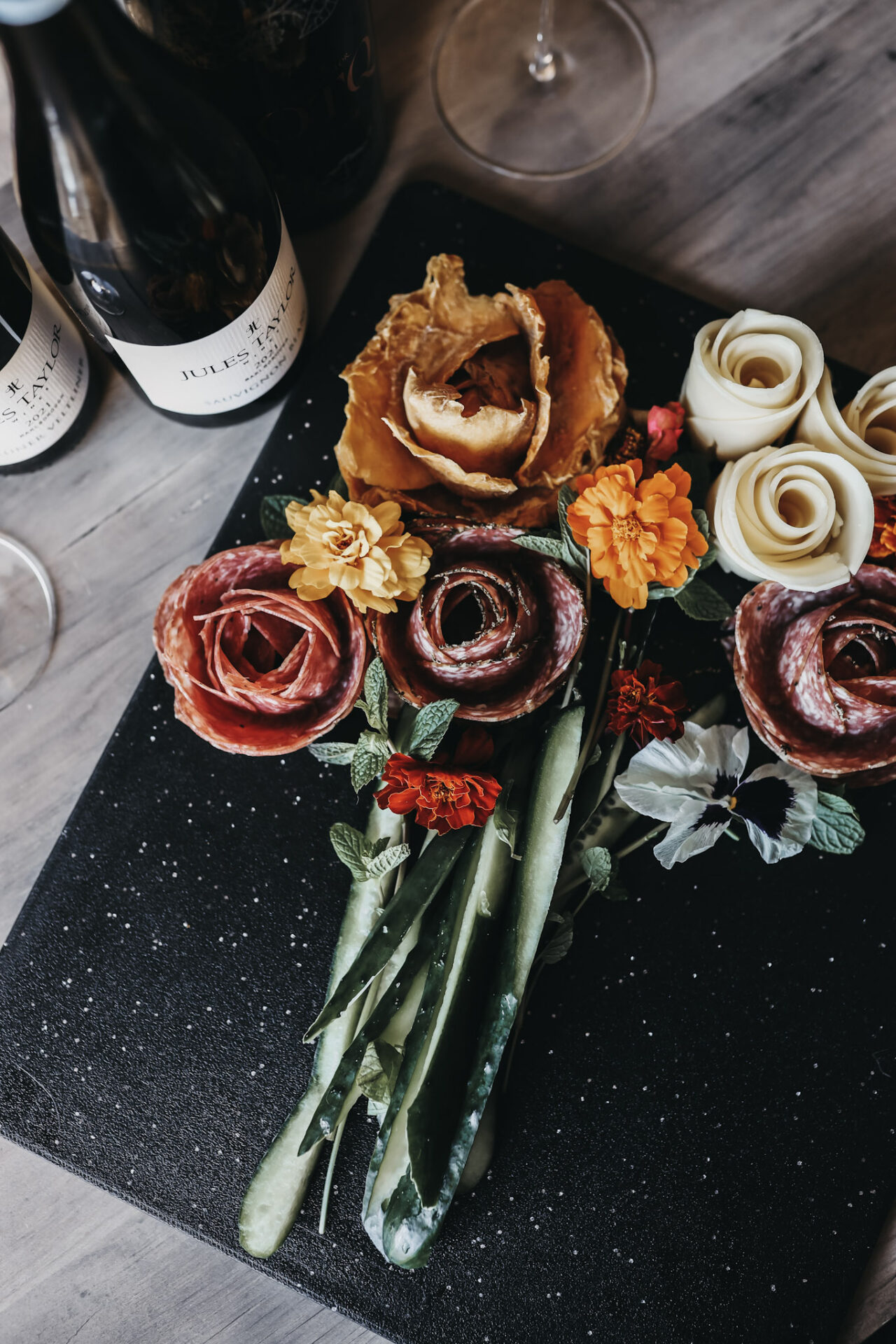 Charcuterie bouquet with wine