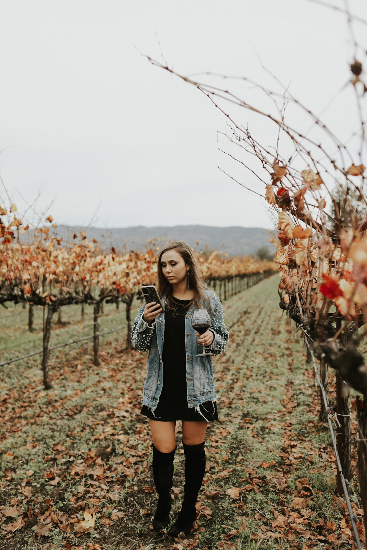 a girl in a California vineyard