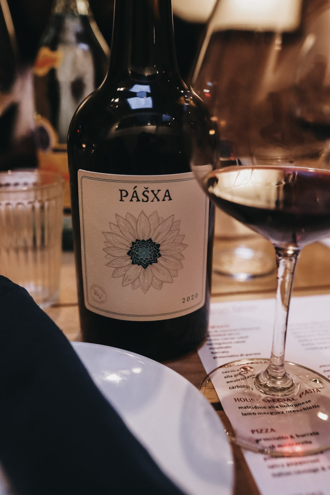 Bottle of Pasxa wine on dinner table
