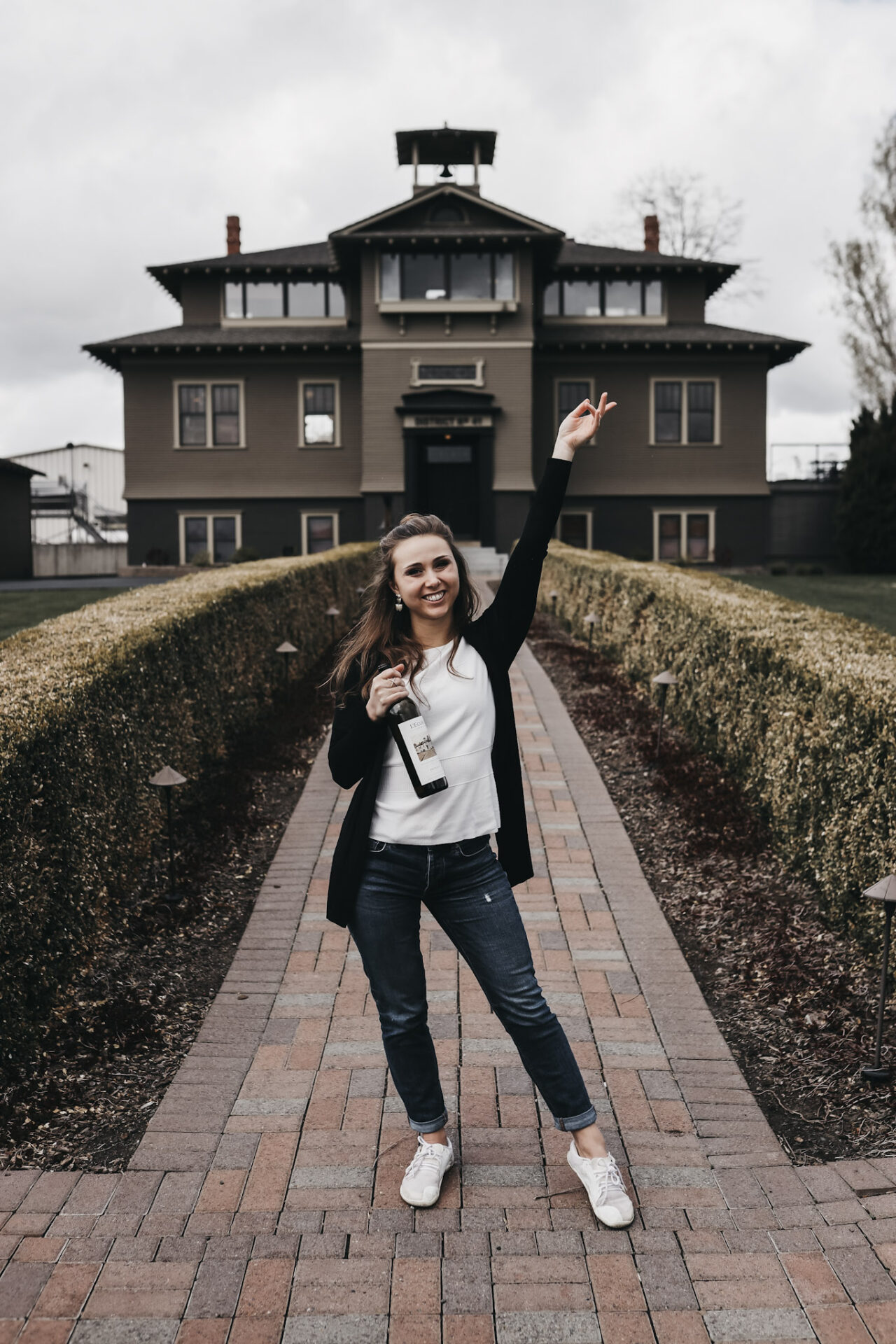 Paige in front of L'Ecole's iconic schoolhouse-turned-winery in Walla Walla