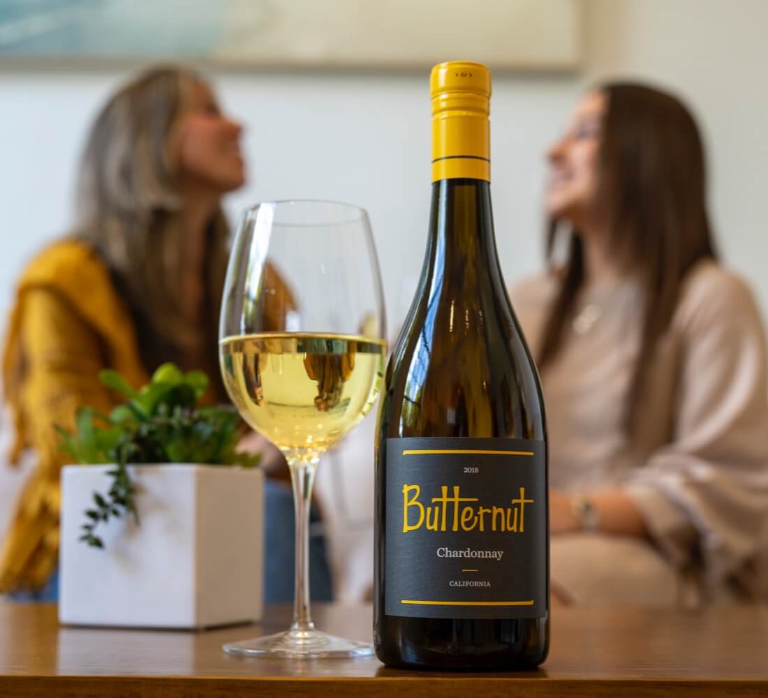 A glass of white wine from Butternut Wines