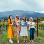 Wine influencers holding Clif Family wines