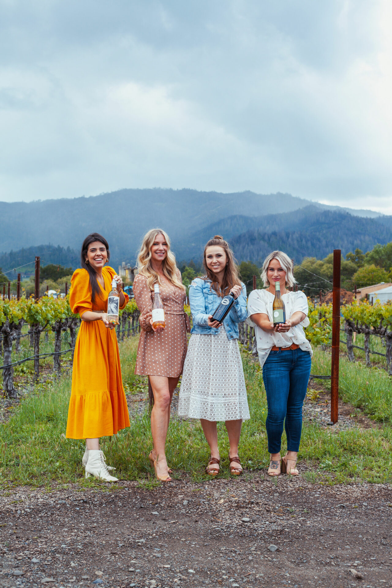 Wine influencers holding Clif Family wines