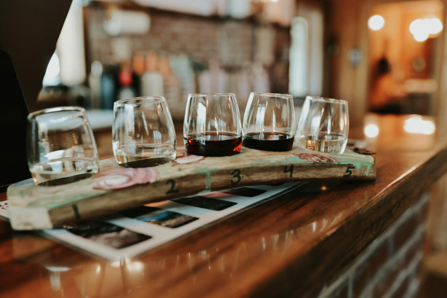 Indian Creek Vineyard wine tasting flight on an oak barrel slab