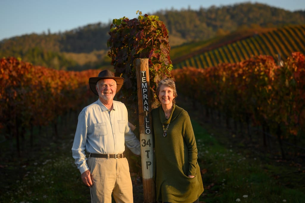 Abacela winery owners in the vineyards in Southern Oregon