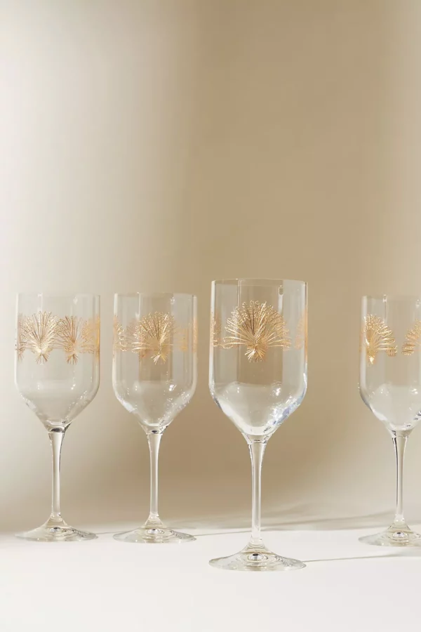 Set of four wine glasses etched with gold