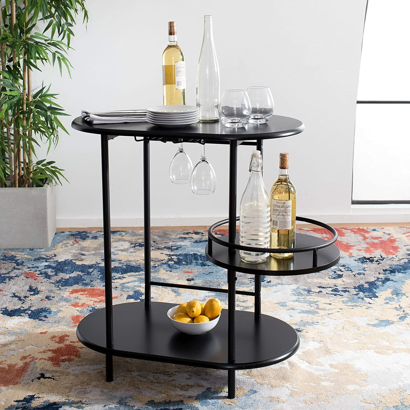 black bar cart with wine bottles