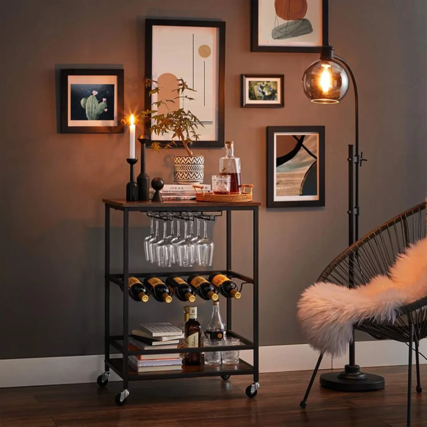 bar cart with wine glasses and wine bottles