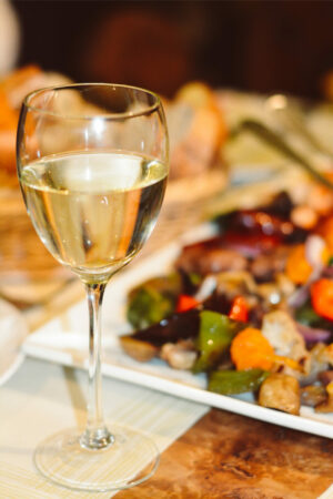 Glass of White Wine with Indian Food - Best Pairings