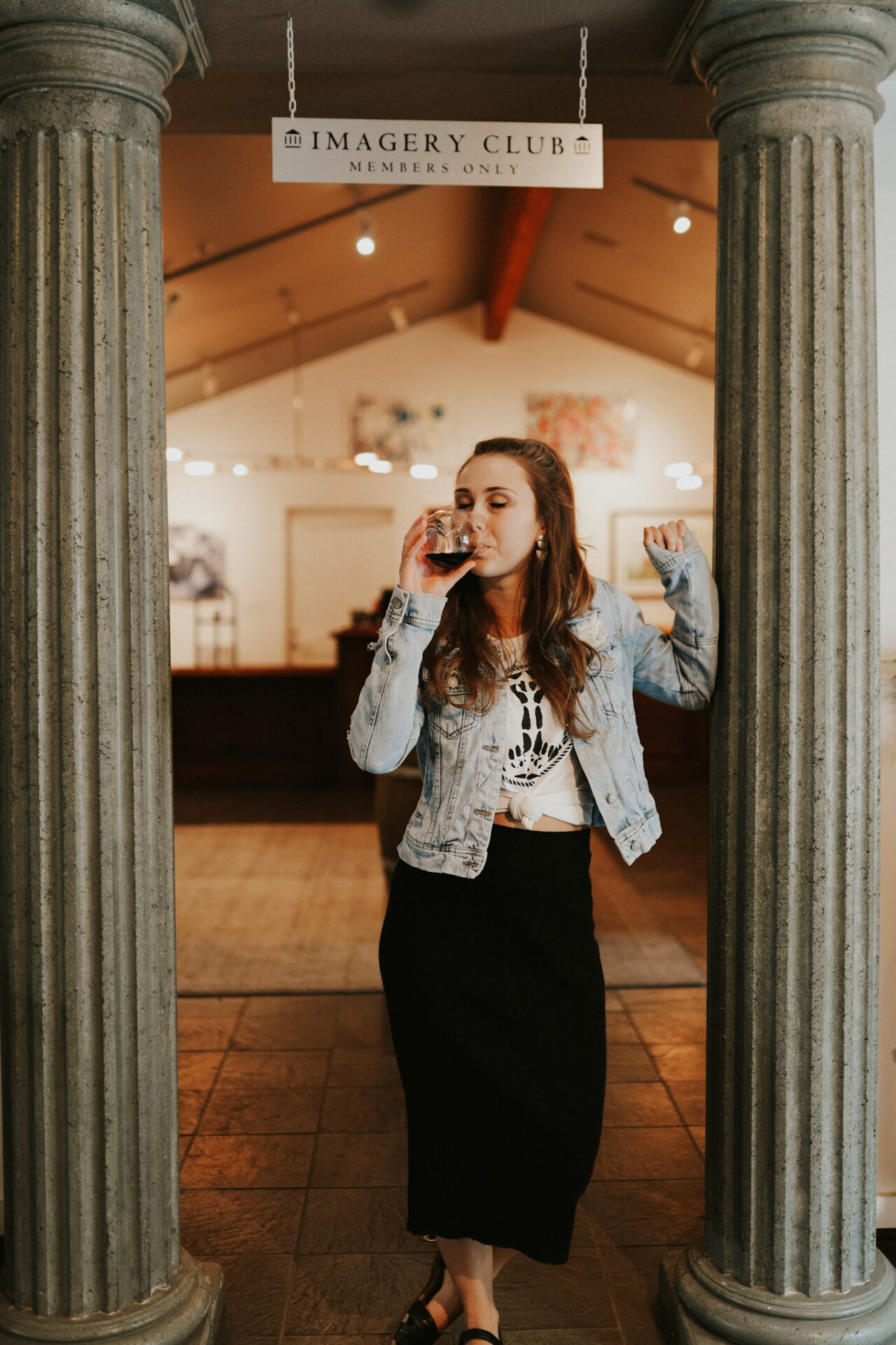 Paige at Imagery Estate Winery drinking wine in Glen Ellen Sonoma winery