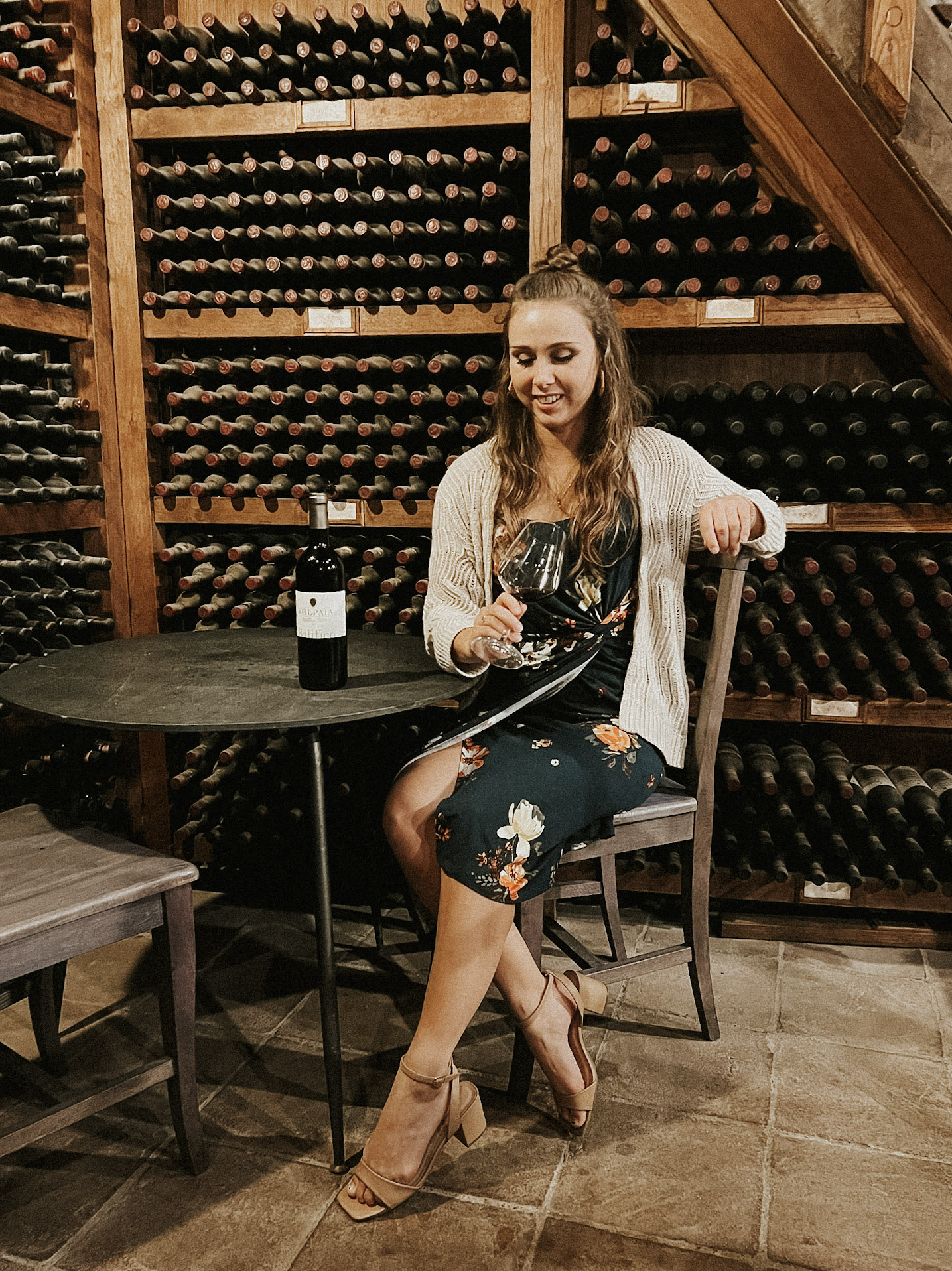 Paige in the wine cellar at Osteria Castello di Volpaia