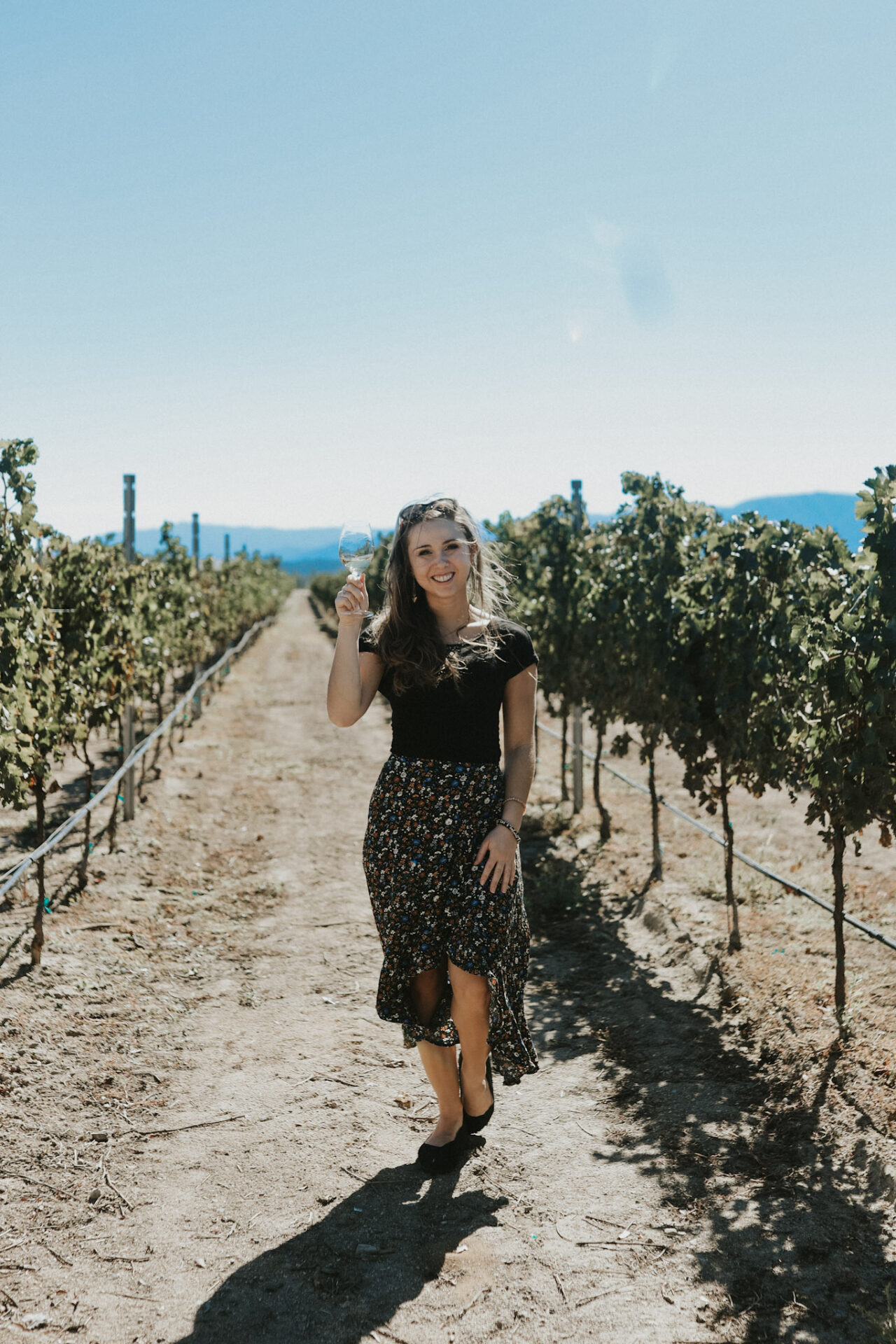 Paige in a vineyard in the best wineries in Temecula