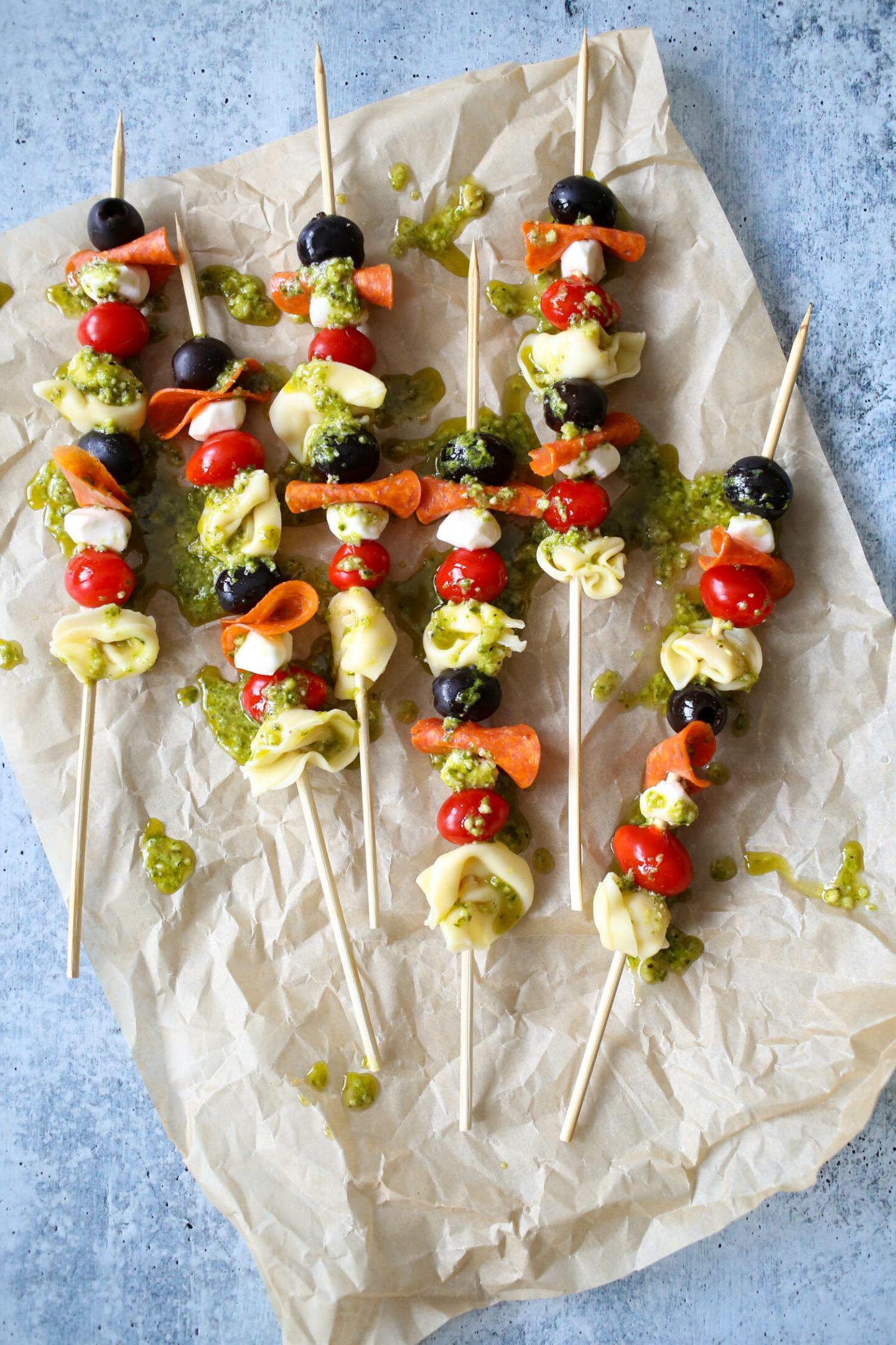 Italian Tortellini Skewers with Pesto Drizzle