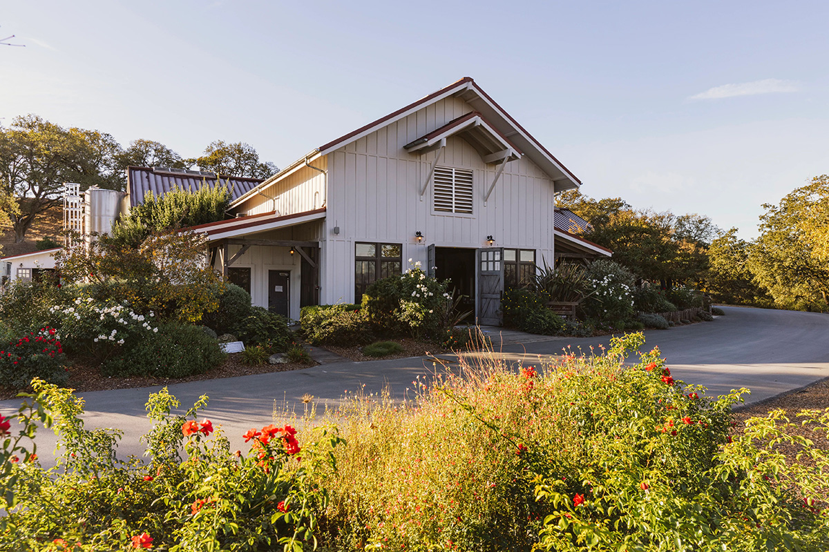 Exterior of barn-style tasting room at Copain Wines in Russian River Valley, CA