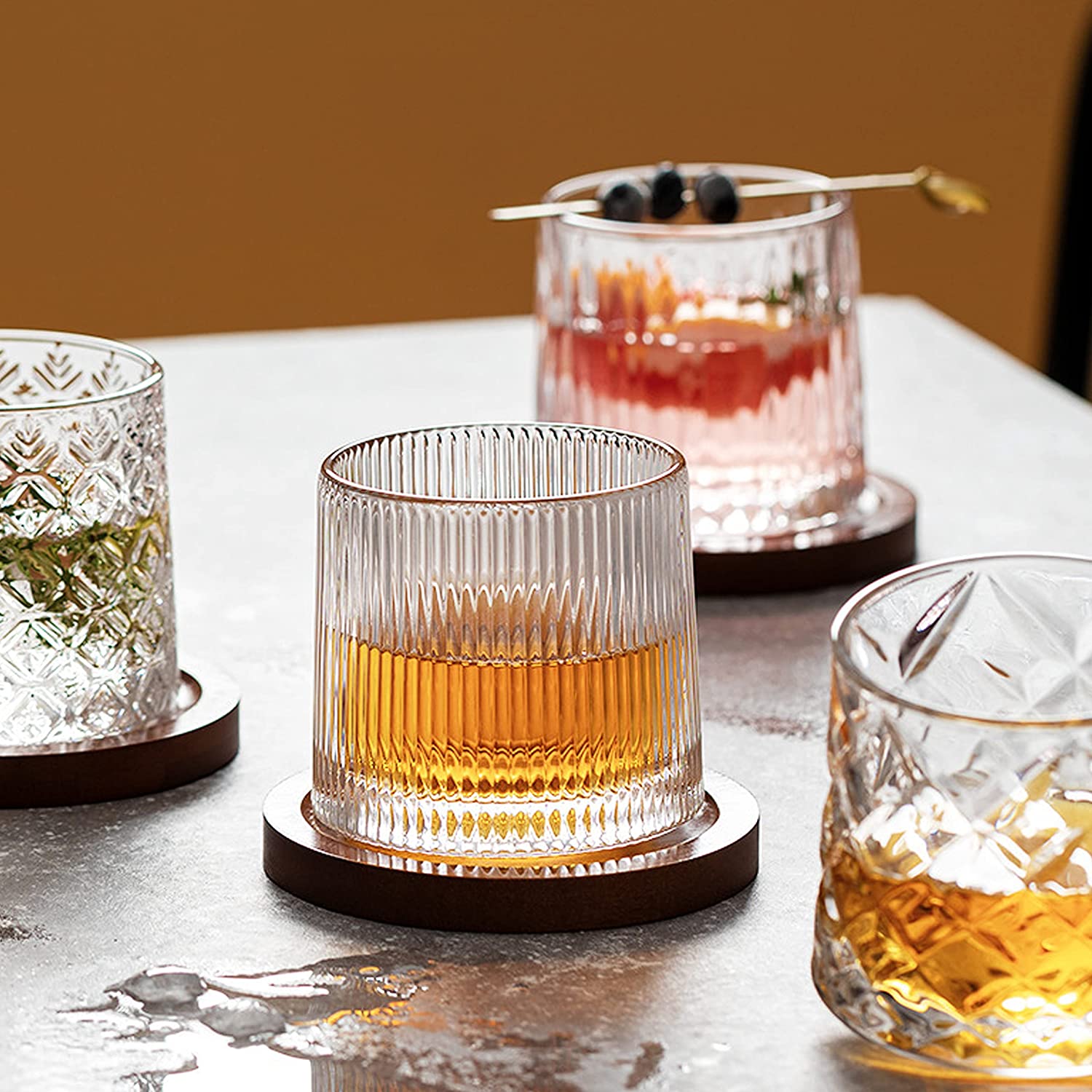 Highball glasses holding a variety of different cocktails