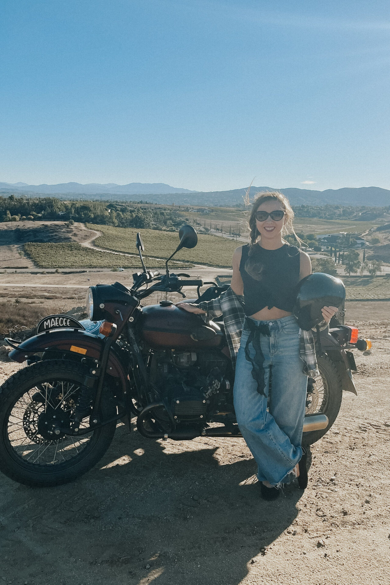 Paige next to a motorcycle sidecar in Temecula, CA