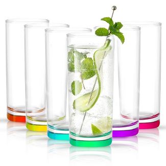 A rainbow array of cocktail glasses, one of which is holding a mojito