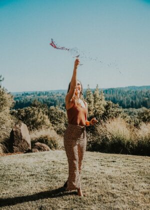 Best Wineries in Sonoma - Paige throwing red wine glass at Gary Farrell in Healdsburg