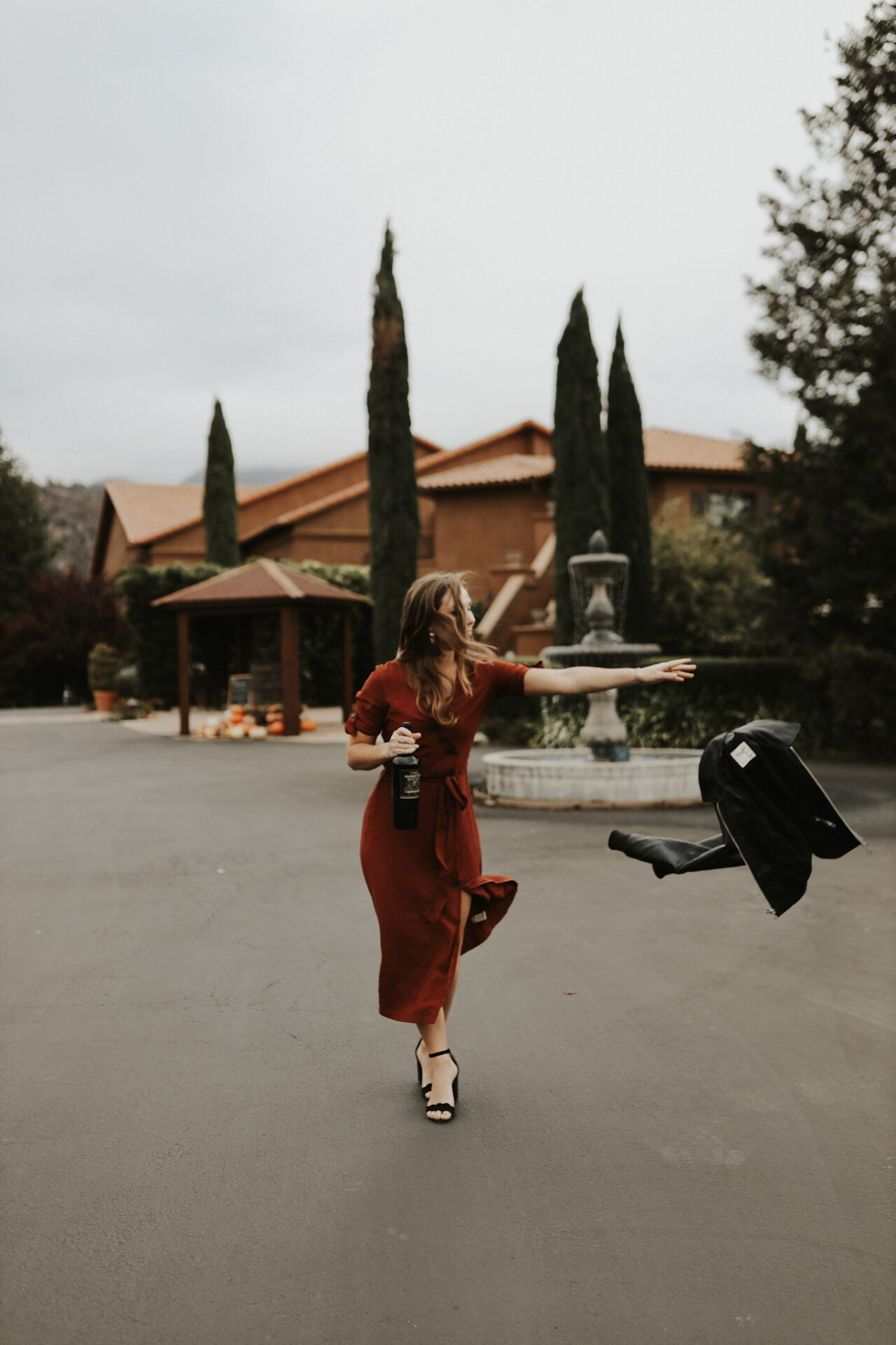 Paige at a winery thinking about Drinking captions for Instagram