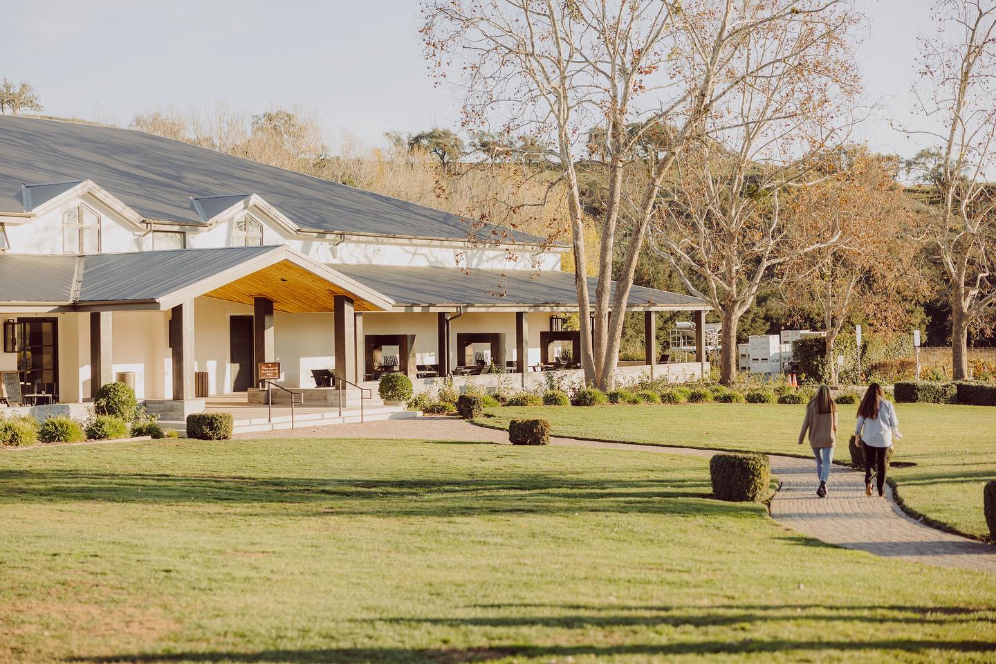 Two girls walking into Fess Parker Winery