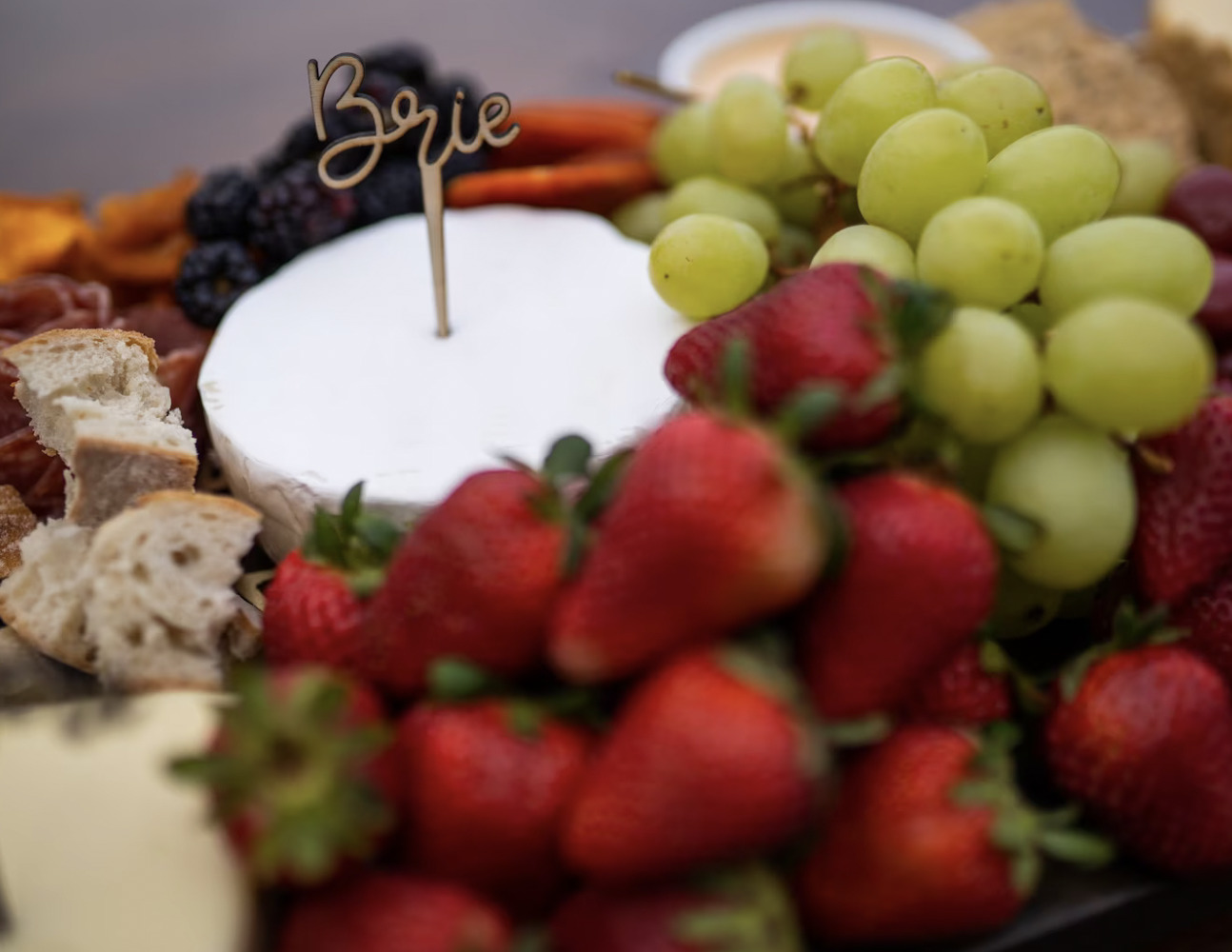 Charcuterie board with brie marked