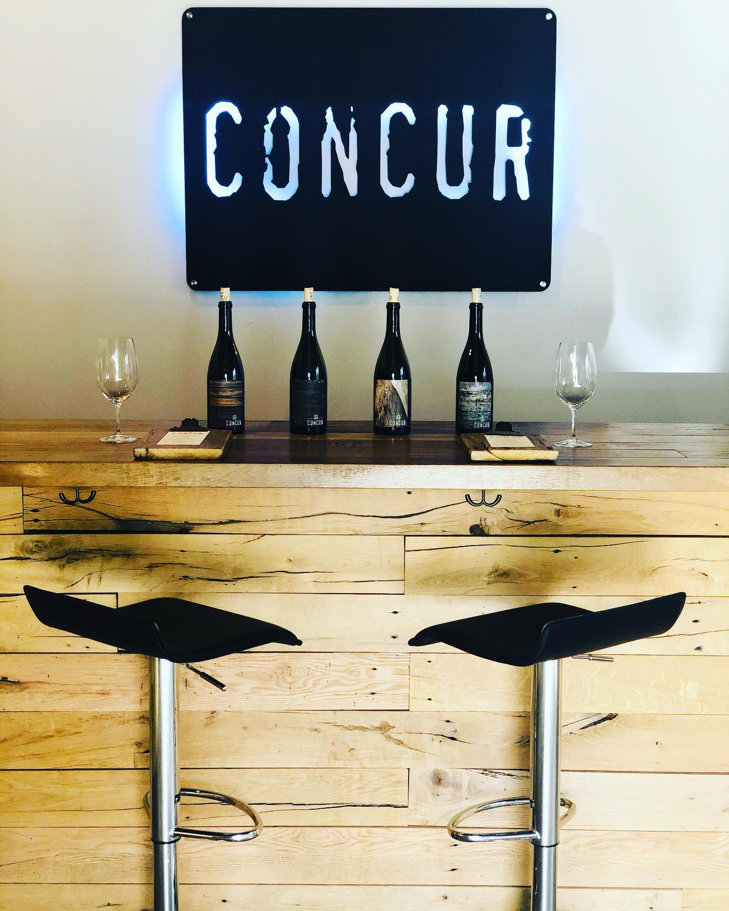Indoor bar seating at CONCUR Wines