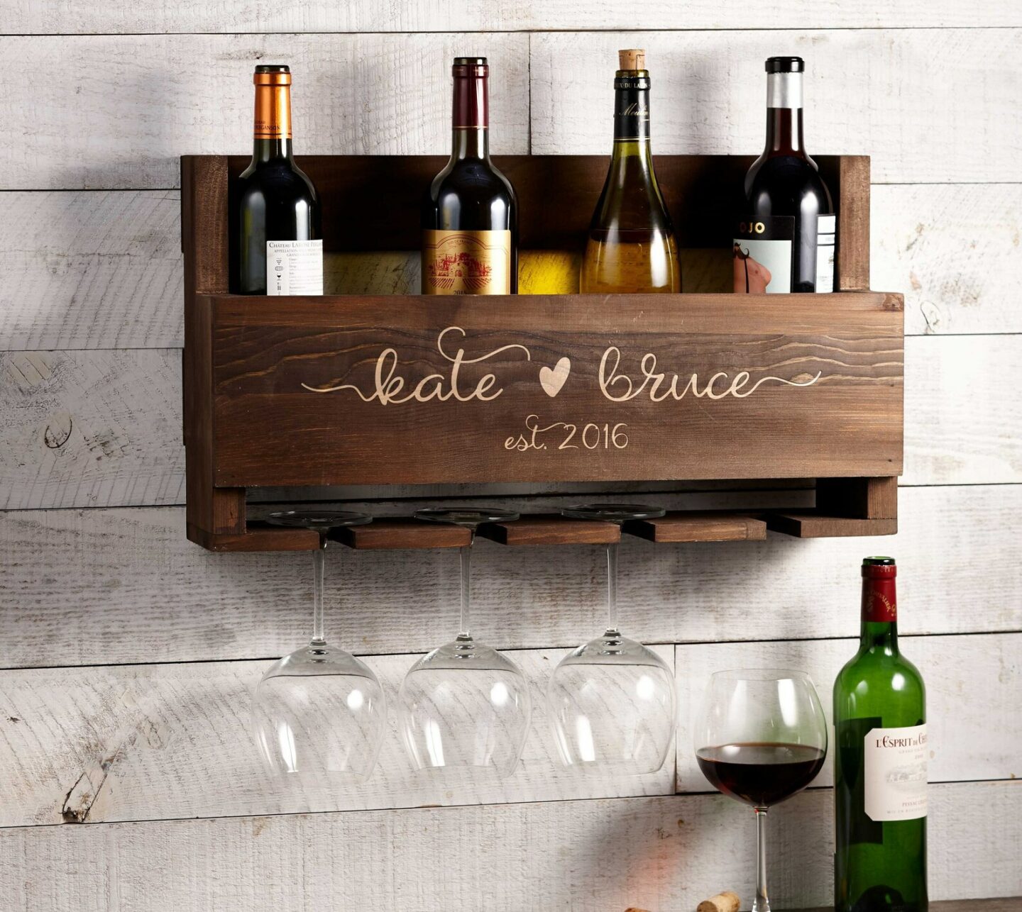 Small personalized wine rack with space for four bottles and a few wine glasses