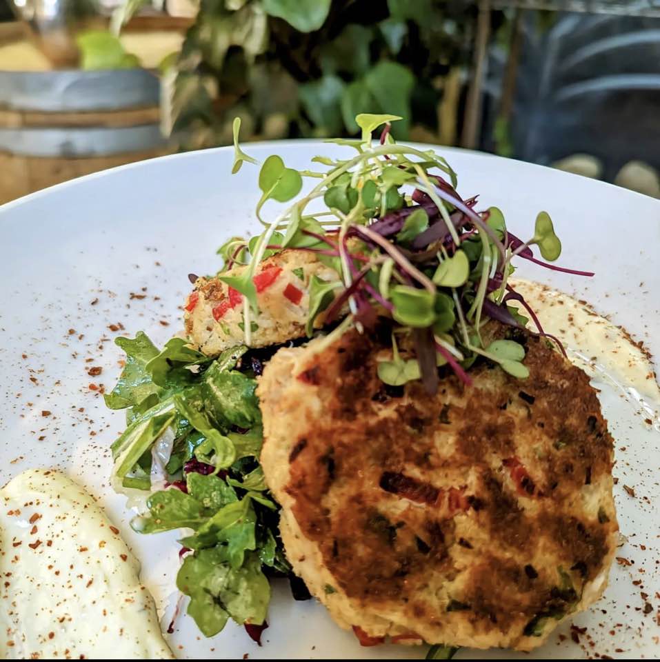 Crab cakes plated at Thomas Hill Organics in CA