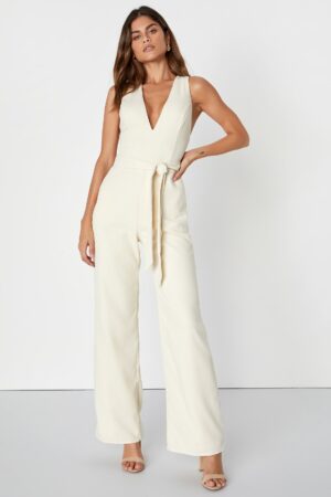 Cream colored jumpsuit with belt