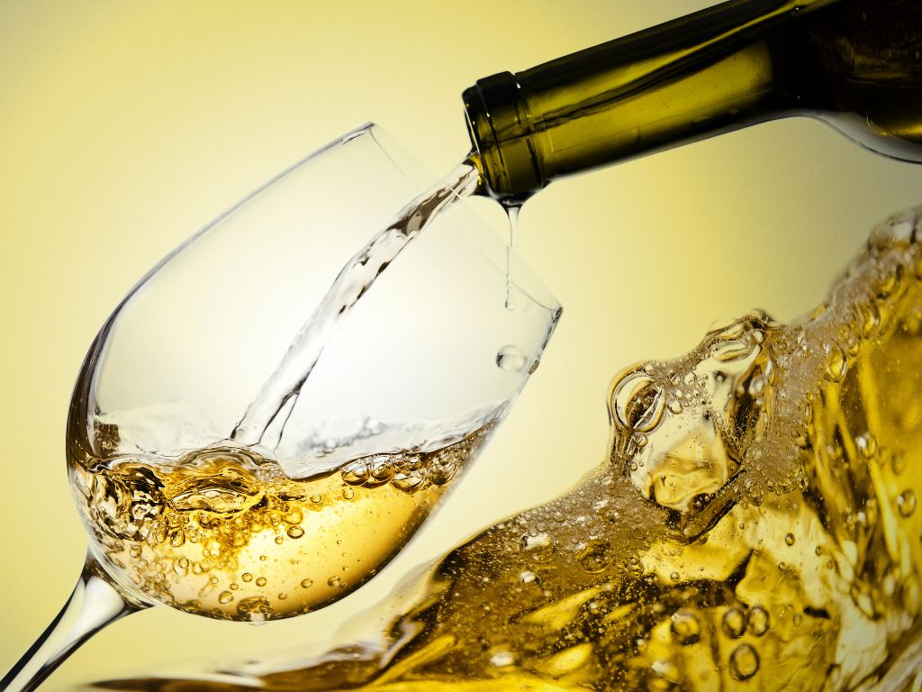 Fumé Blanc white wine being poured into a glass