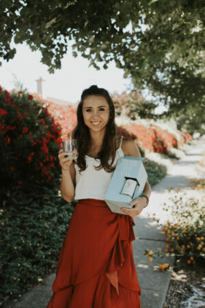Paige holding dry white wine