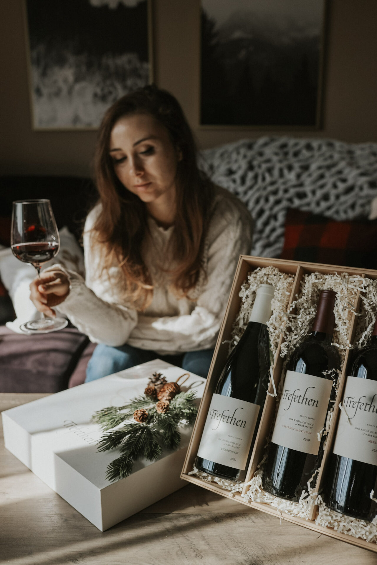 Paige with a glass of red wine and Trefethen Holiday Wine Gift Sets