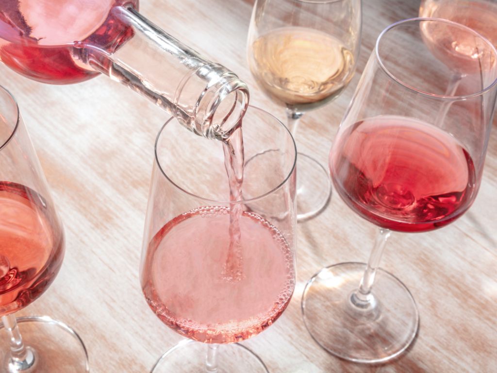 Assortment of white merlot pink wines in glasses