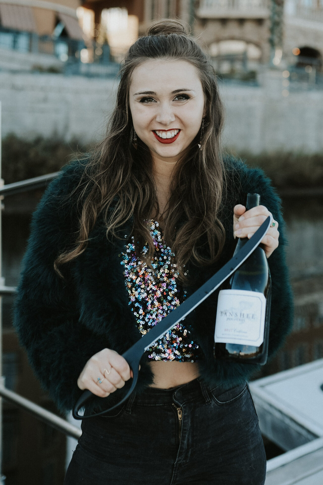 Paige holding Vinotive Champagne Saber