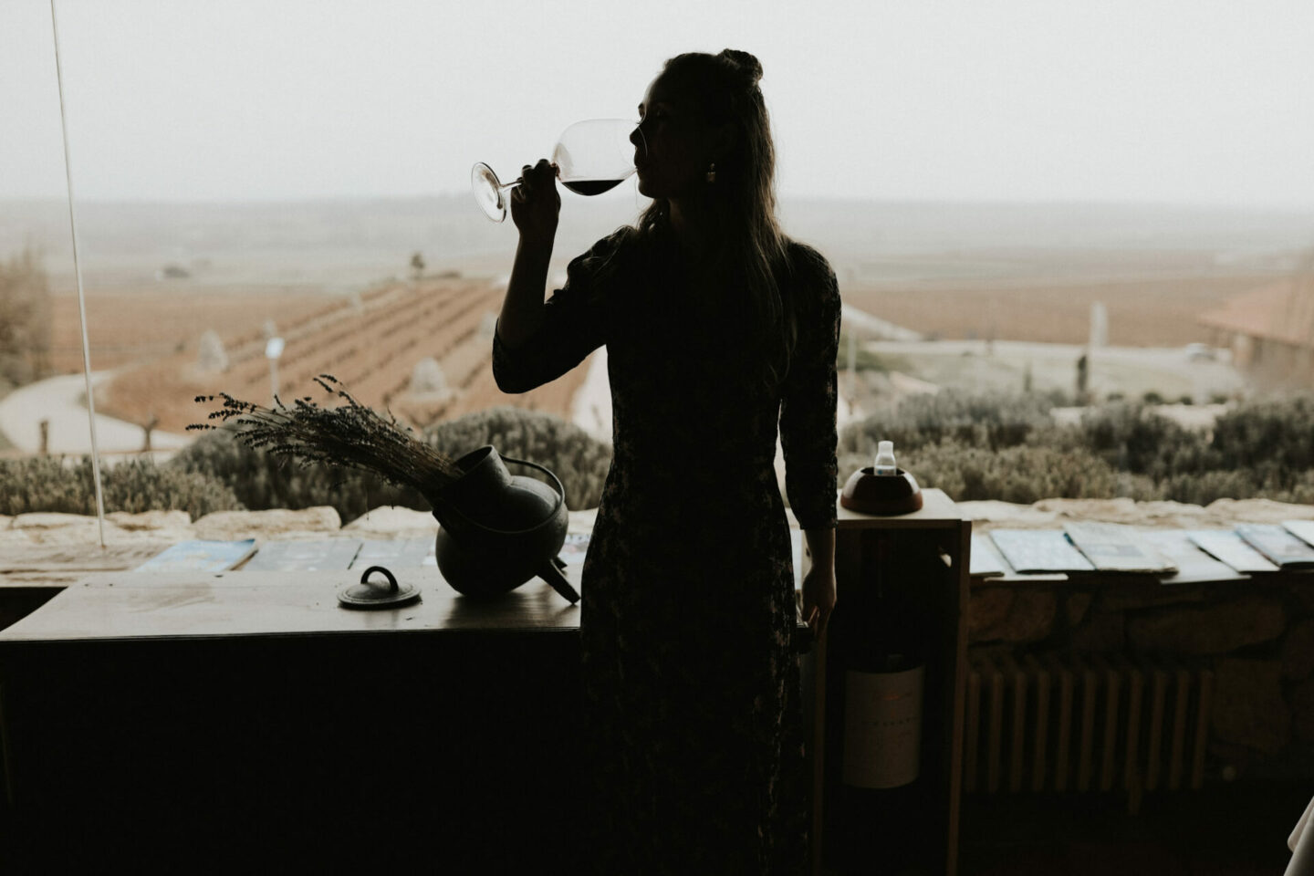 Paige at a winery in Spain drinking Tempranillo