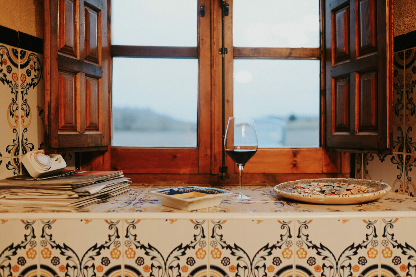 Glass of Spanish Garnacha on a windowsill