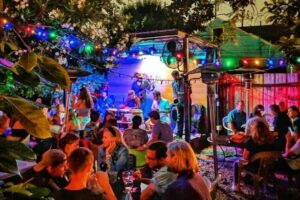 Outdoor entertainment and drinks at Bacchanal Wine Bar in NOLA