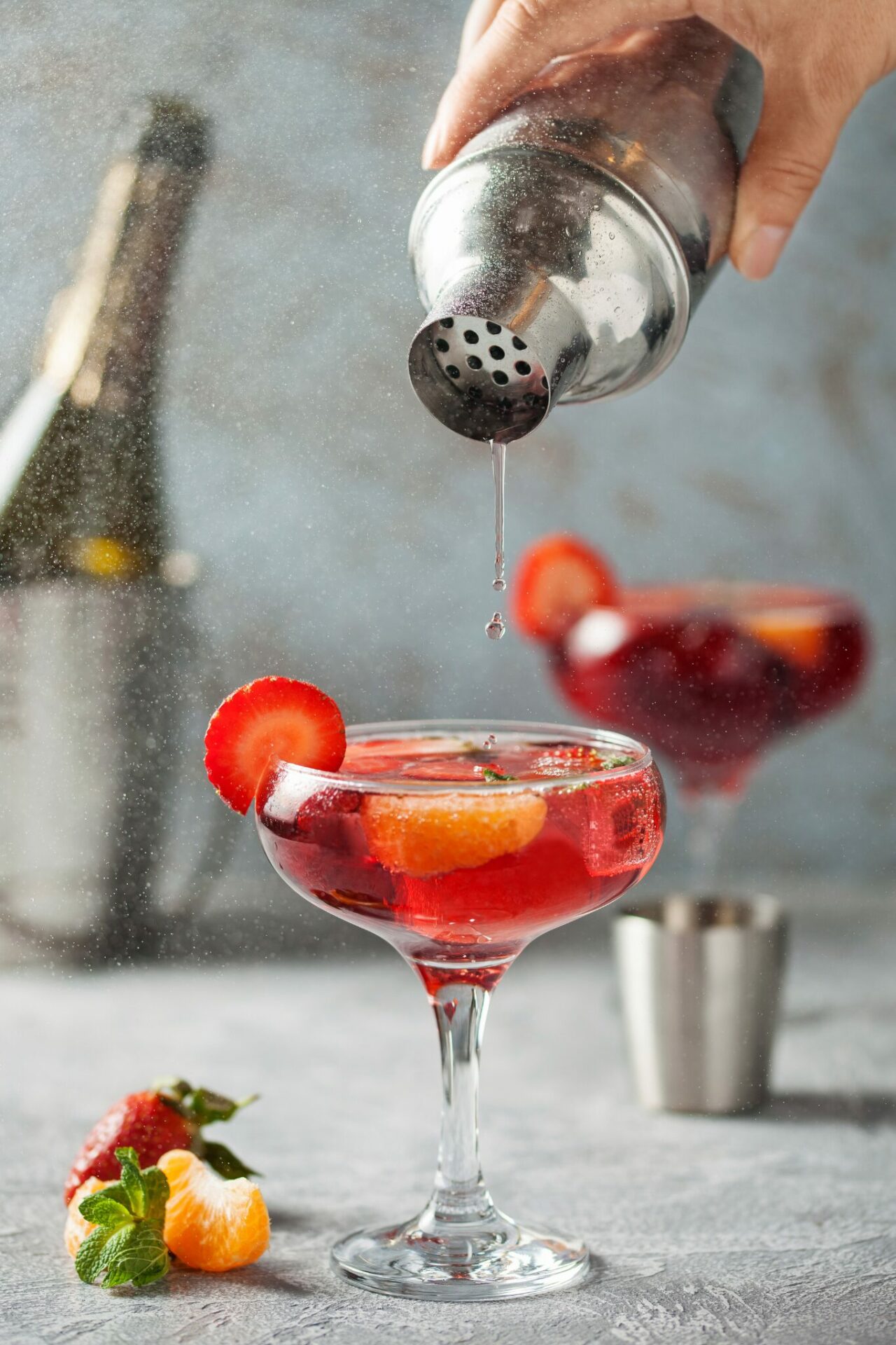 Wine being poured into a Sangria cocktail