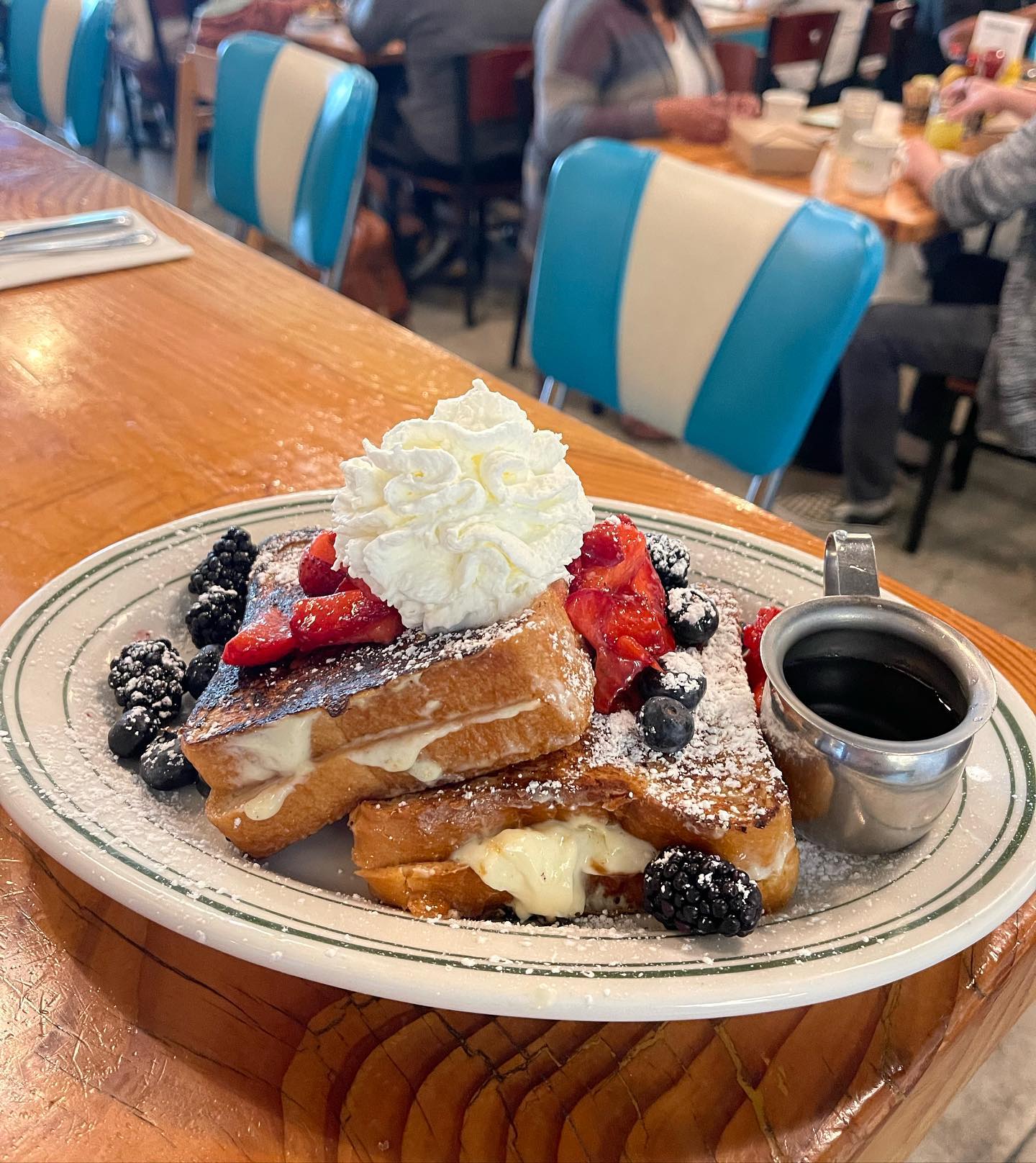 Banana Fosters French Toast sitting on counter of Sunshine Cafe
