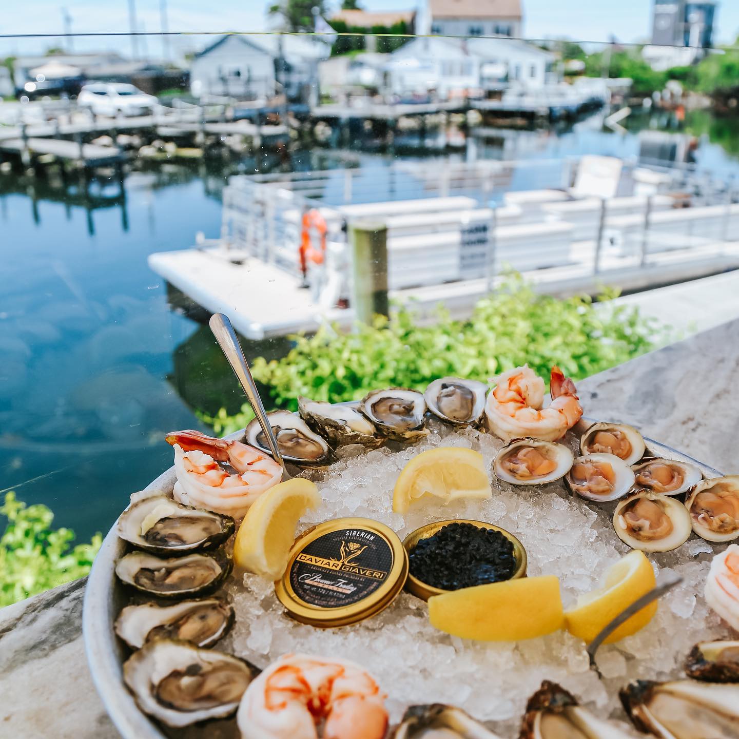 Raw bar offerings with a water view