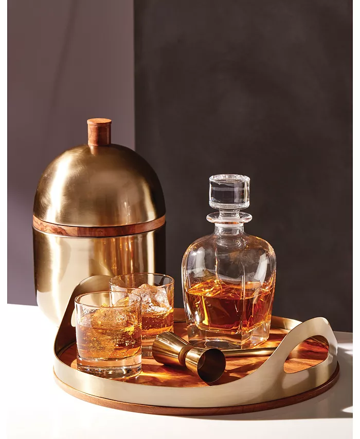 cocktail set including a jigger, two cocktail glasses, and a glass decanter. a try and an ice bucket.