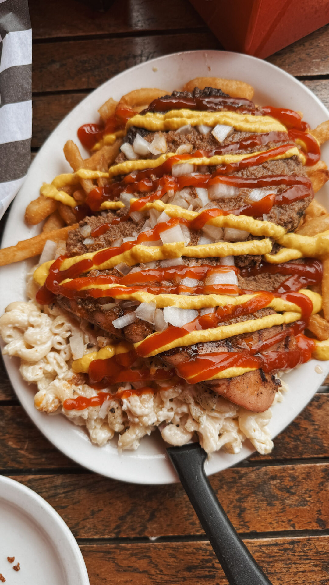 Rochester Garbage Plate - a combination of hot dog, hamburger, pasta salad, beans, and more